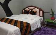 ห้องนอน 6 Comfort Room at Homestay Krysan Syariah