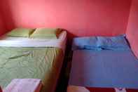 ห้องนอน Homestay Bougenville Dieng