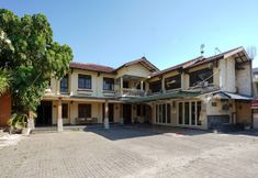 외관 6 OYO 1018 Penginapan Darma Ii