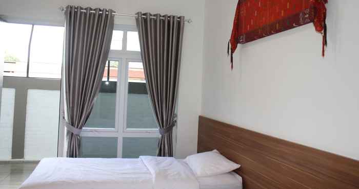 Kamar Tidur The Sasta Hotel