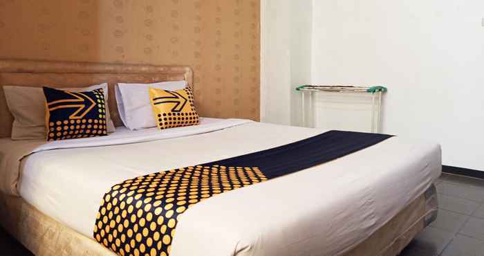 Kamar Tidur SPOT ON 2353 Wisma Executive Demang