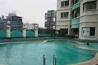 Swimming Pool 2BR Puri Kemayoran Apartment Jakarta 85m2 WIFI  by Imelda