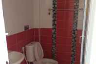 Phòng tắm bên trong ThanaVille Resort Maesot