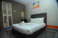 Bedroom AMT Budget Hotel Melaka