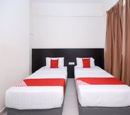 Kamar Tidur 7 Super OYO 1148 Kenyalang Suite