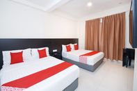 Kamar Tidur Super OYO 1148 Kenyalang Suite