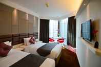 Kamar Tidur Stanford Hotel