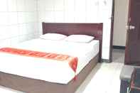 ห้องนอน Hotel Kartika Banjarmasin