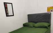 Kamar Tidur 7 QQ Homestay