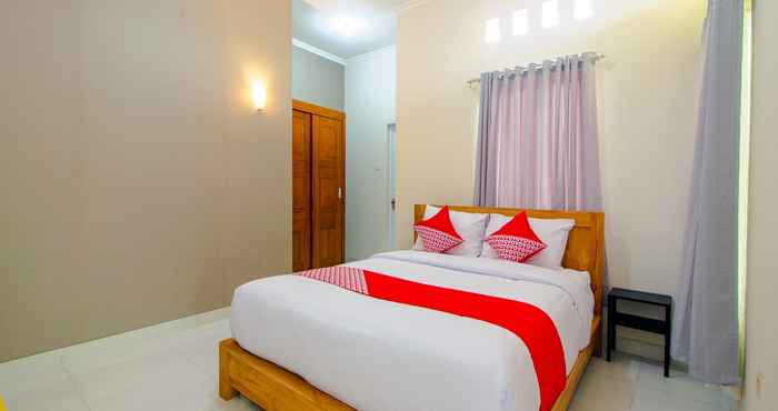 Kamar Tidur OYO 1355 Griya Wismono Homestay