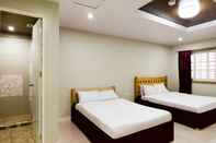 Kamar Tidur Country Artist Hotel