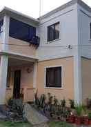 EXTERIOR_BUILDING Villa Margarita's Homestay