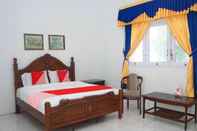 Bedroom OYO 1148 Pelangi Hotel New Teluk Uber