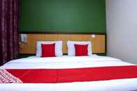 Bilik Tidur SUPER OYO 44054 Holiday Mansion Inn