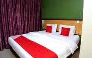 Bilik Tidur 3 SUPER OYO 44054 Holiday Mansion Inn