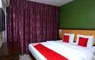 Bilik Tidur 2 SUPER OYO 44054 Holiday Mansion Inn