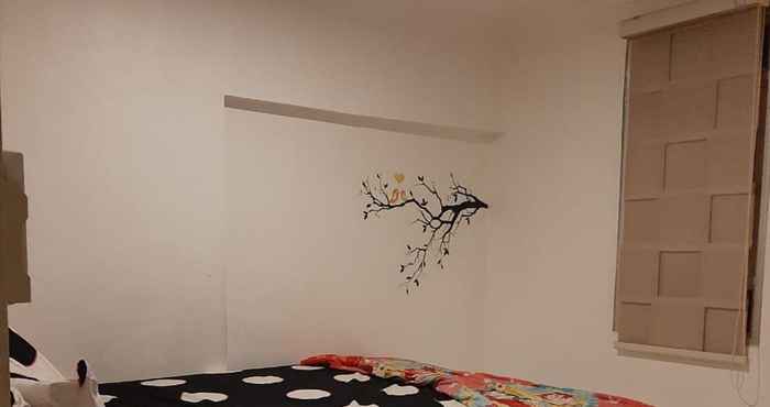 Bedroom Studio Room Apartemen Modernland by Aya Property