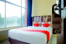 Bedroom Hotel O Pekanbaru near Mall Ciputra Seraya formerly Lotus Inn