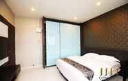 ห้องนอน 4 JJH Serviced Apartments