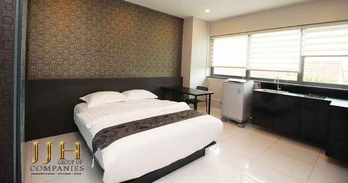 Bedroom JJH Serviced Apartments