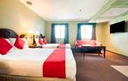 Bilik Tidur 5 OYO 227 Palladium Suites Hotel