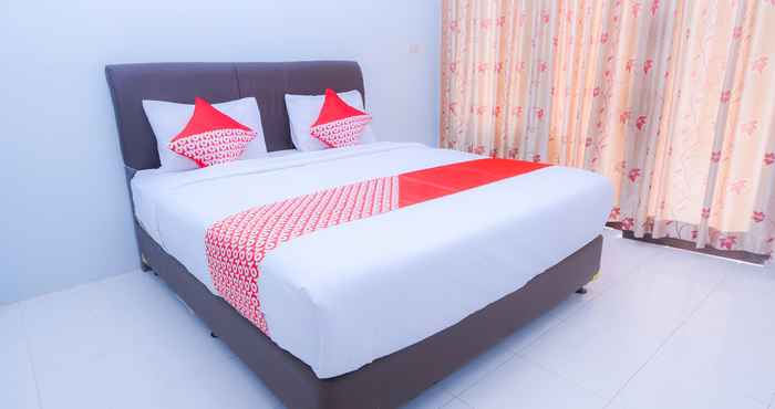 Kamar Tidur OYO 1498 Pak Har Bungalow