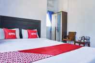 Kamar Tidur SUPER OYO 1565 Hotel Homiko