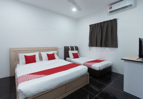 ห้องนอน OYO 44011 Weng Bee Guest House