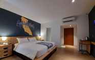 Kamar Tidur 2 Merlyns Garden Inn Syariah