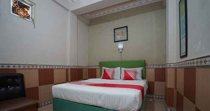 ห้องนอน OYO 1441 Hotel Dempo Permai