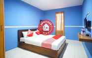 Kamar Tidur 7 OYO 1272 Grand Garuda Guest House