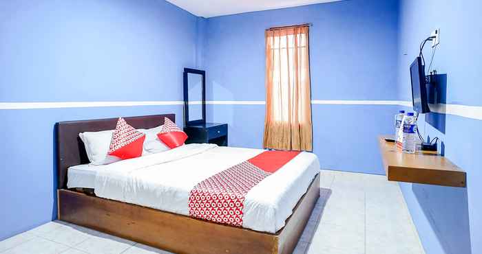 ห้องนอน OYO 1272 Grand Garuda Guest House