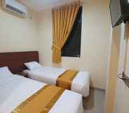 Bedroom 4 Harmony Inn Belitung - City Hotel