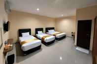 Bedroom Harmony Inn Belitung - City Hotel