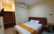 Bedroom 3 Harmony Inn Belitung - City Hotel