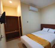 Bedroom 3 Harmony Inn Belitung - City Hotel