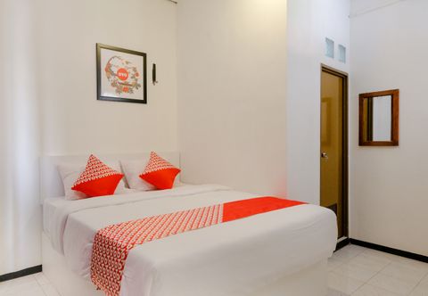Kamar Tidur Hotel O Kina Family Residence Syariah