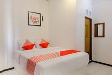 Kamar Tidur Hotel O Kina Family Residence Syariah