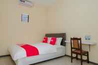 Bedroom OYO 1455 Little Creek Family Stays Syariah