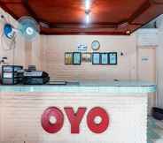 Lobby 7 OYO 1961 Losmen Guntari