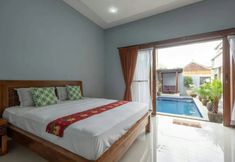 Bedroom 2 Ocean View Villa Ratna 23