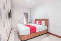 Kamar Tidur OYO 1555 Unik Guesthouse Syariah