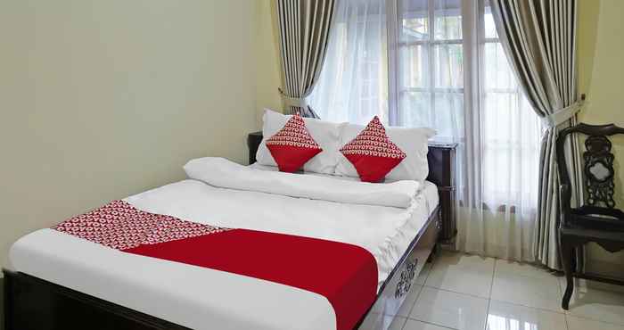 Bedroom OYO 335 Wisma Empat Lima Syariah