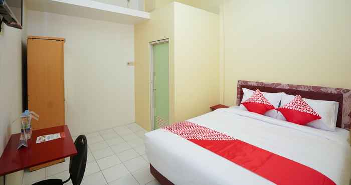Phòng ngủ OYO 1624 Panjang Jiwo Residence Near RSU Premier Surabaya Kota Surabaya