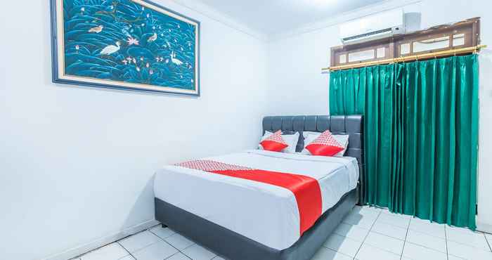 Kamar Tidur OYO 1424 Guntary Residence