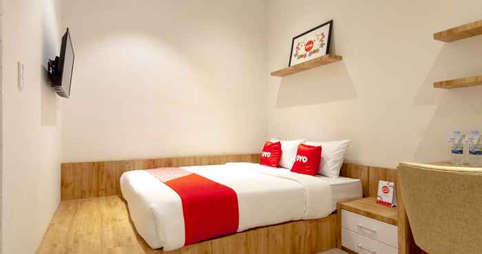 Phòng ngủ OYO 1476 Asoka Family Residence