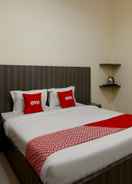 BEDROOM OYO 1694 Pariban Homestay