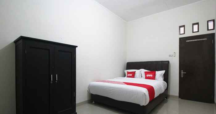 Bedroom OYO 1547 Wisma Ray Syariah