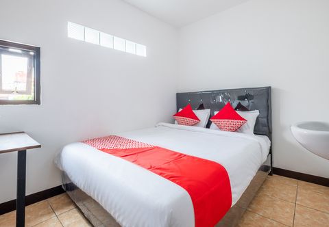 침실 OYO 1460 Anyelir Residence