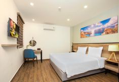 卧室 5 Titan Hotel ( former Golden Lotus Central)